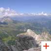 On the left, Sass de Putia partially hidden by clouds - picture taken from the top of Piz del Puez | Courtesy of: Club Aquile Rampanti
